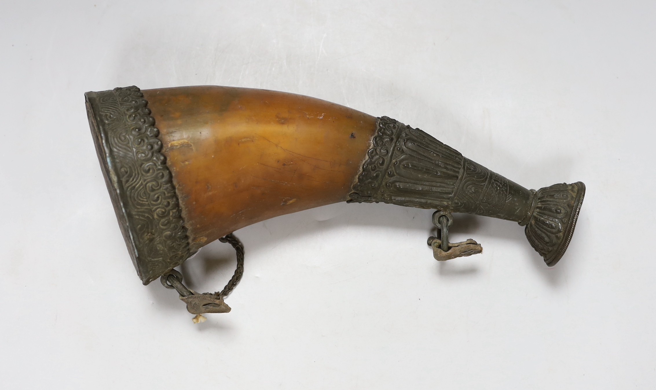 A large Tibetan metal mounted horn flask, 31cms high